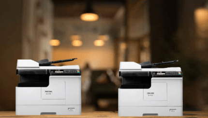 Ricoh M 2310N vs M 2810N A3 multifunction printers side by side in modern office environment